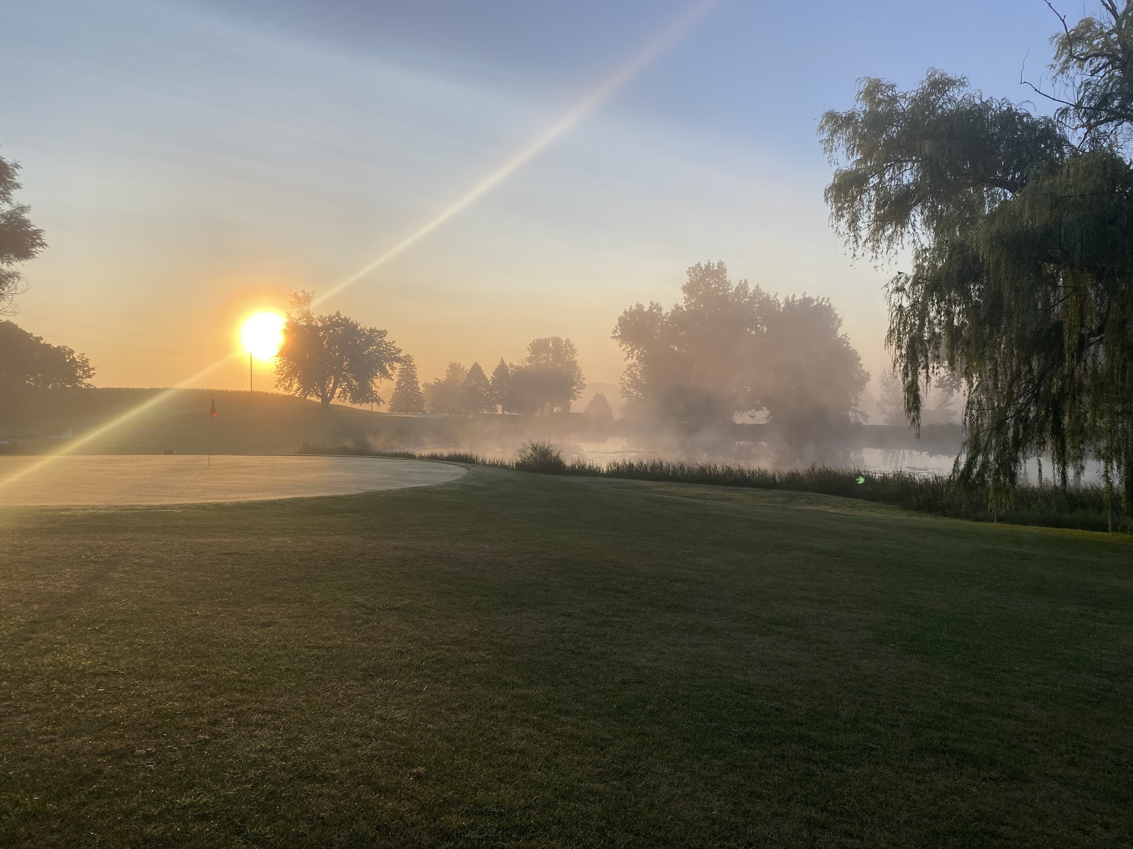 Morning mist over the pond at Collison Par 3 in Marshalltown, Iowa